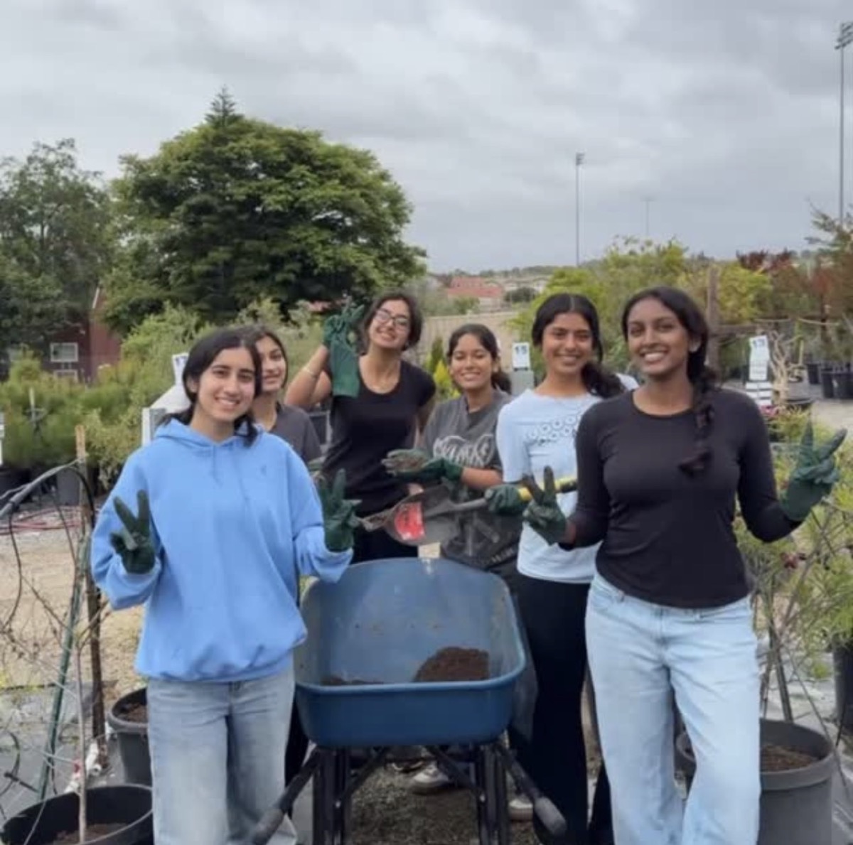 Project RISHI members volunteering together at Shadetree Nursery