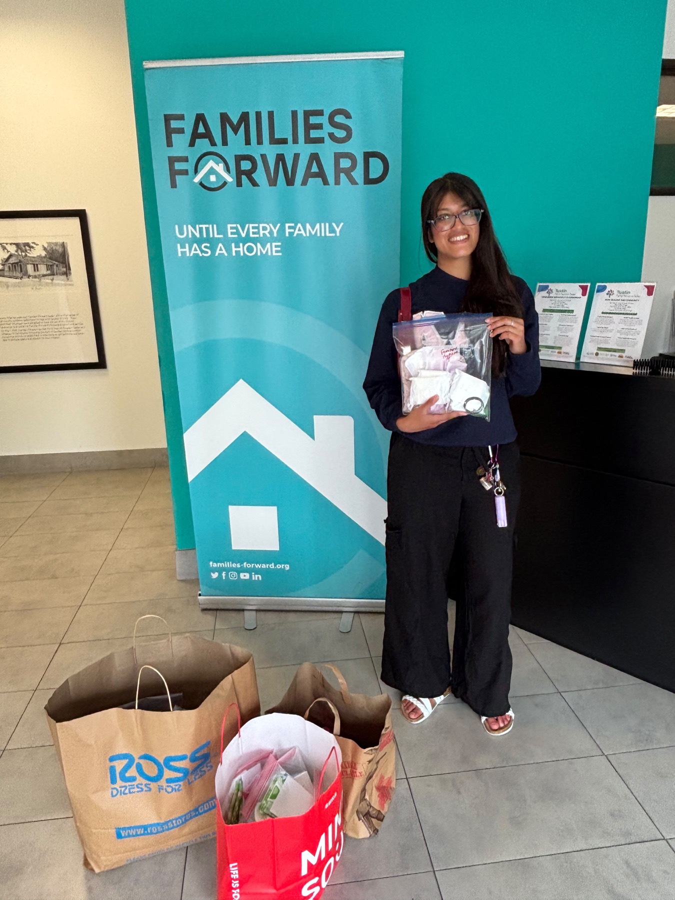 Project RISHI member delivering reproductive health packs to Families Forward