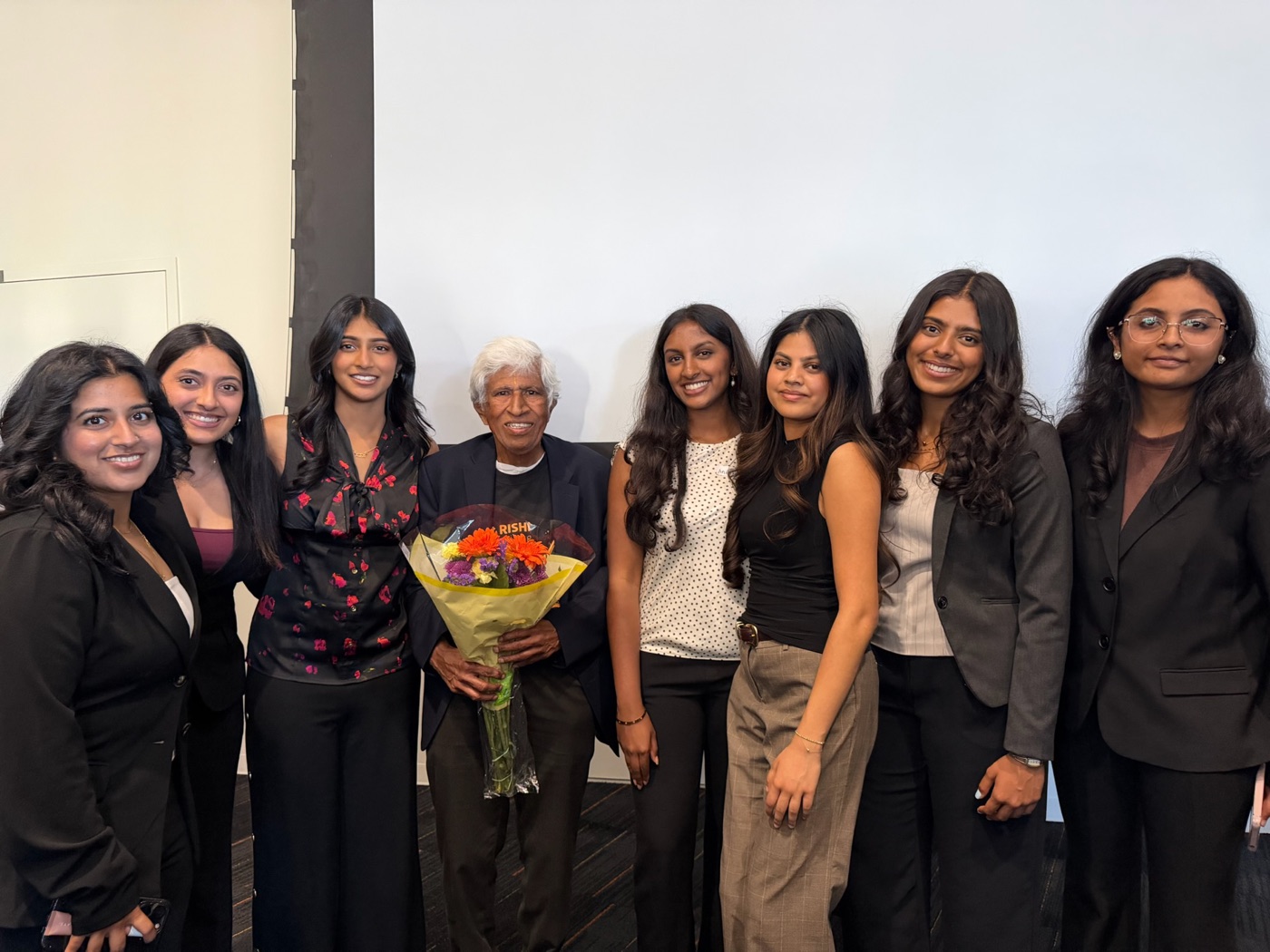 Project RISHI members with a guest speaker after a chapter learning event